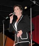 Singing at Moore & Moore's Fan Club Party on June 4, 2014