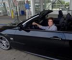 Sitting in a BMW convertible owned by a fan I met outside the Shreveport Airport